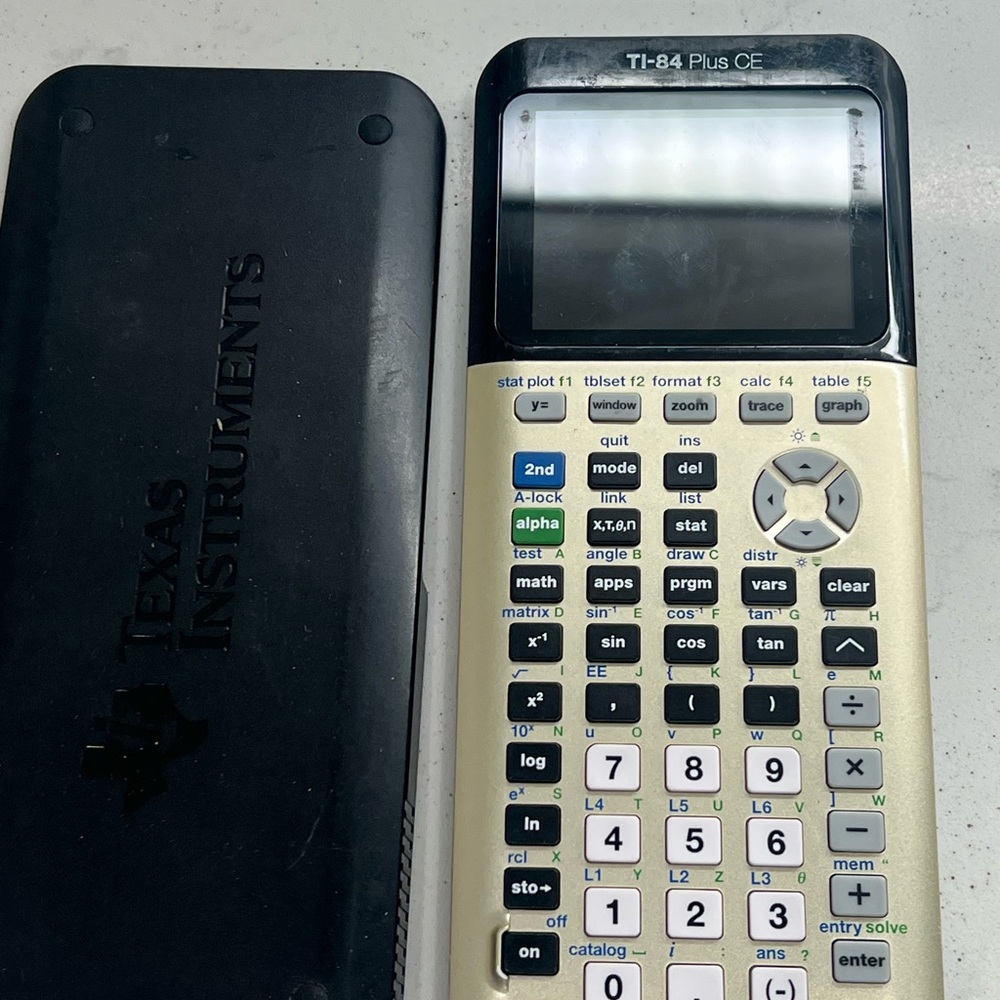 Texas Instruments TI-84 Plus CE Graphing Calculator Silver Grey Needs Charged